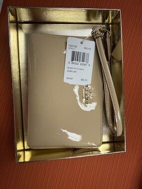 Coach Patent Leather Wristlet in Light Beige